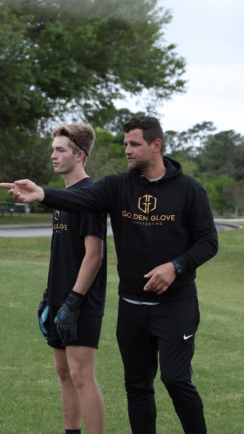 Coach Gorrick directing a keeper — communication and positioning